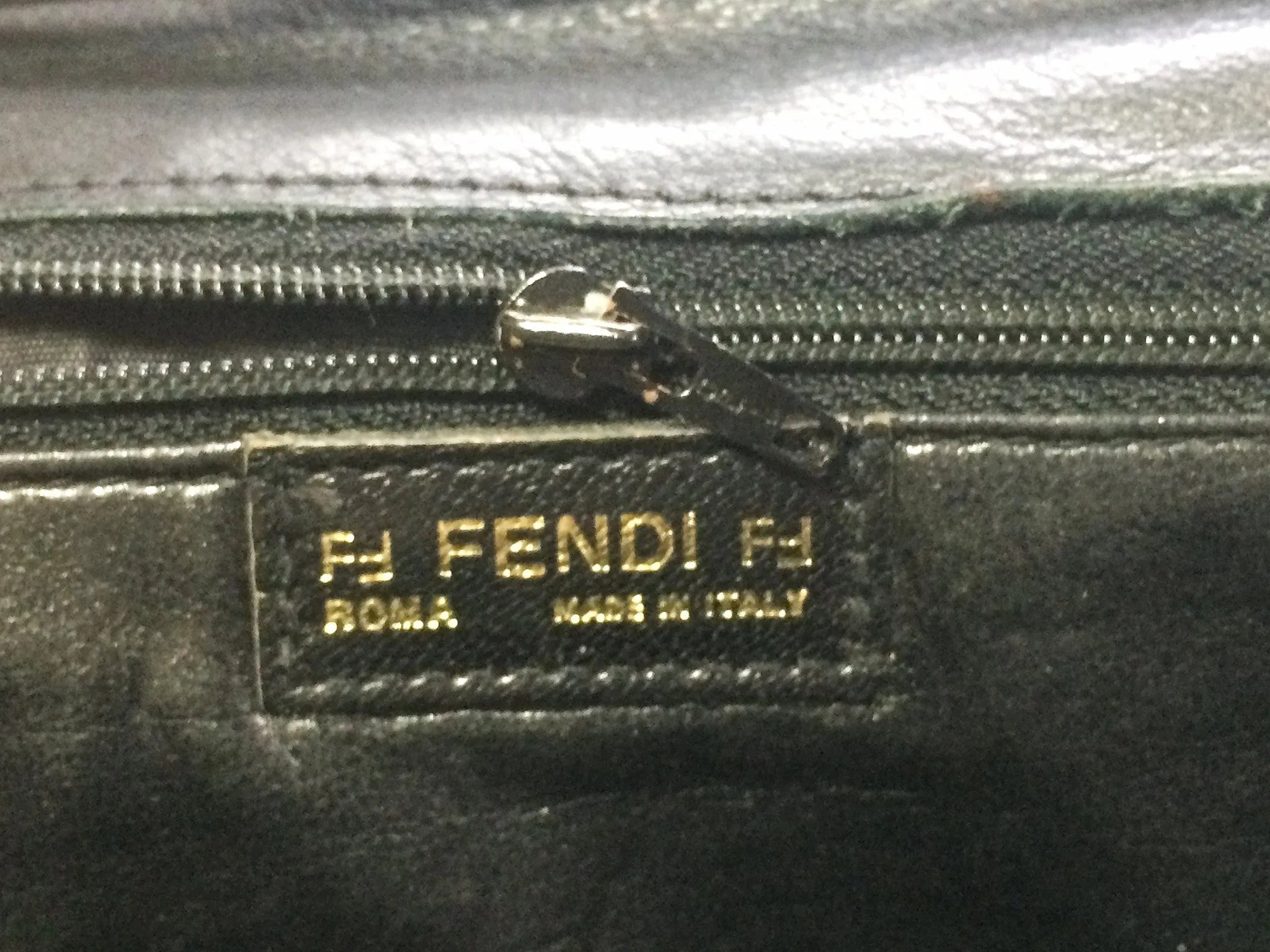 70's, 80's vintage FENDI black nappa leather oval round shape shoulder purse. Can be a clutch bag as well.