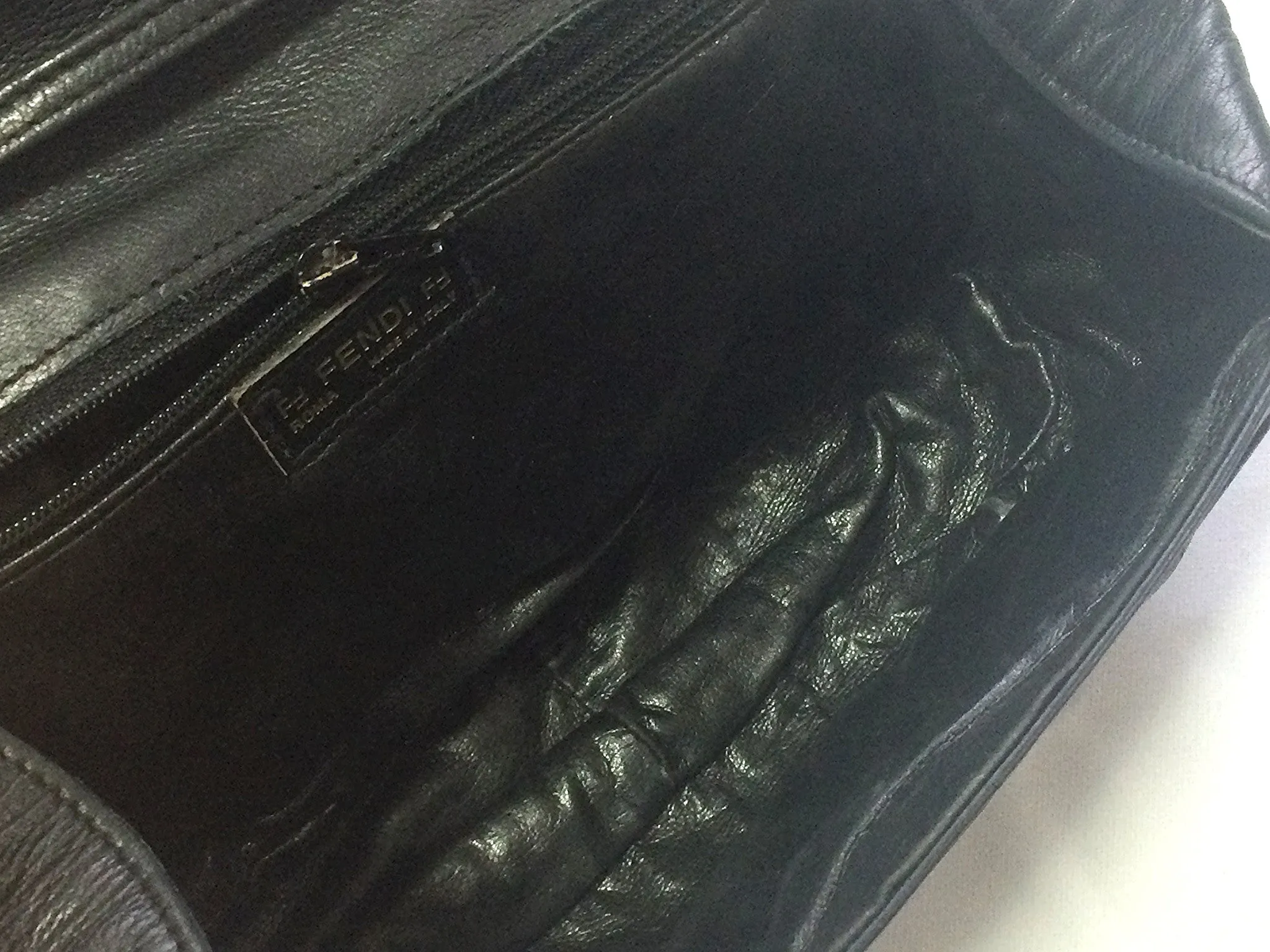 70's, 80's vintage FENDI black nappa leather oval round shape shoulder purse. Can be a clutch bag as well.
