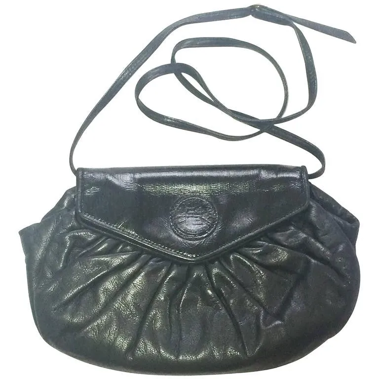 70's, 80's vintage FENDI black nappa leather oval round shape shoulder purse. Can be a clutch bag as well.