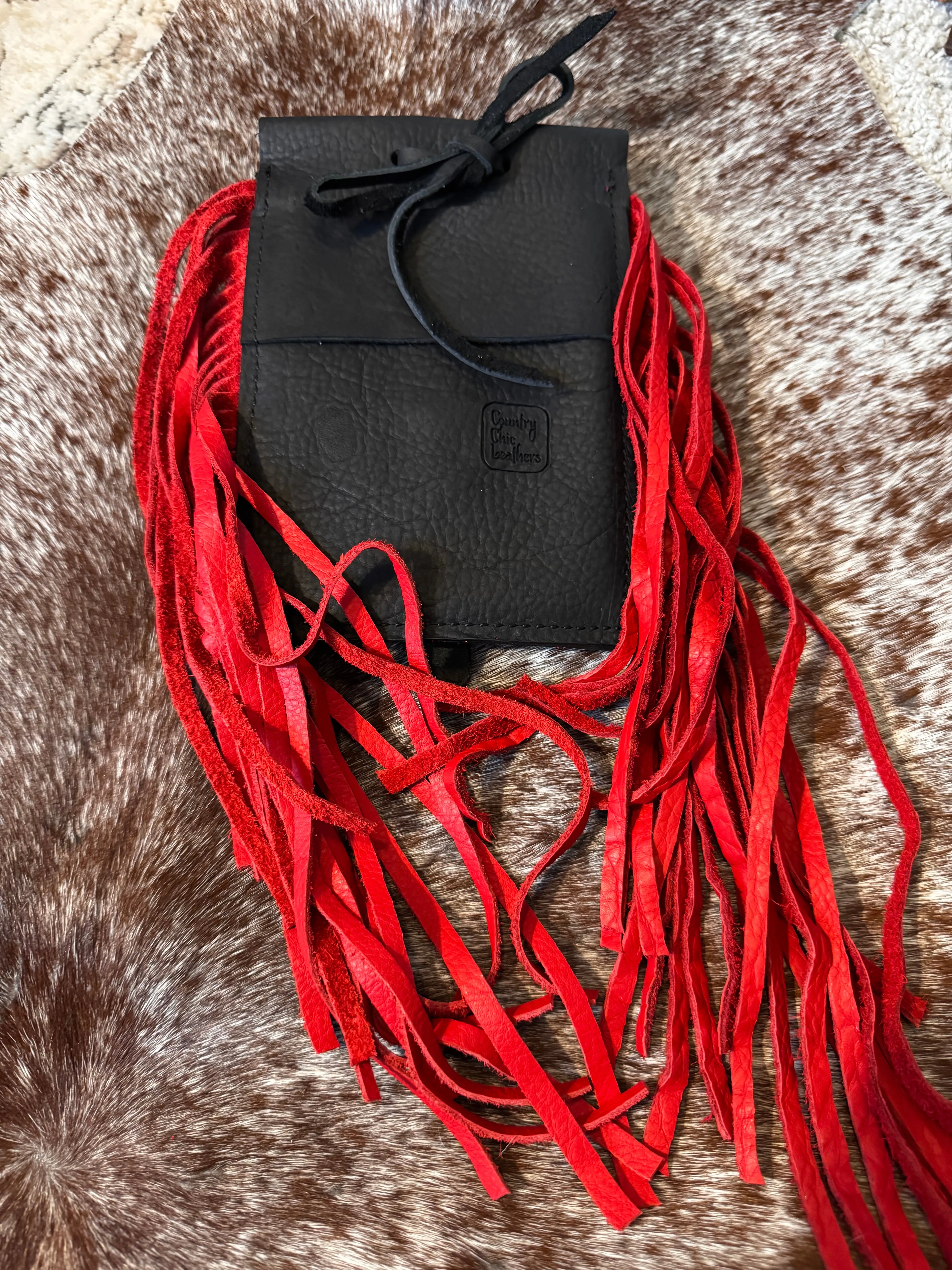 Back cinch saddle cell phone holder