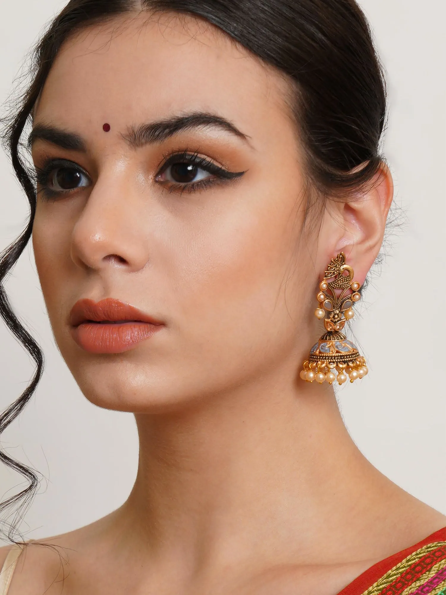 Karatcart Gold Plated Grey Stone Studded Peacock Shape Jhumki Earrings for Women