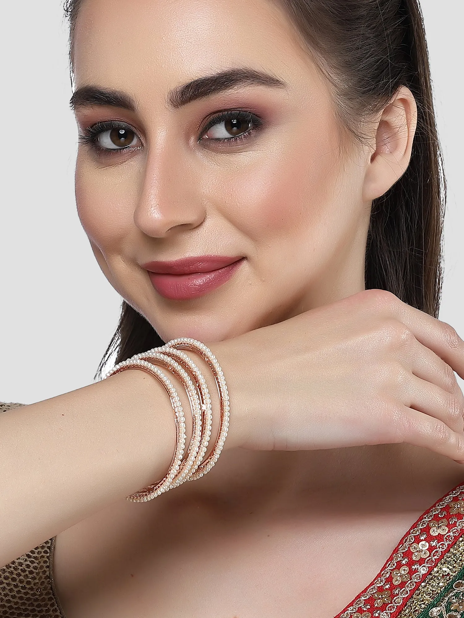 Karatcart Rose Gold Plated Set of 4 Pearl Studded Bangles for Women