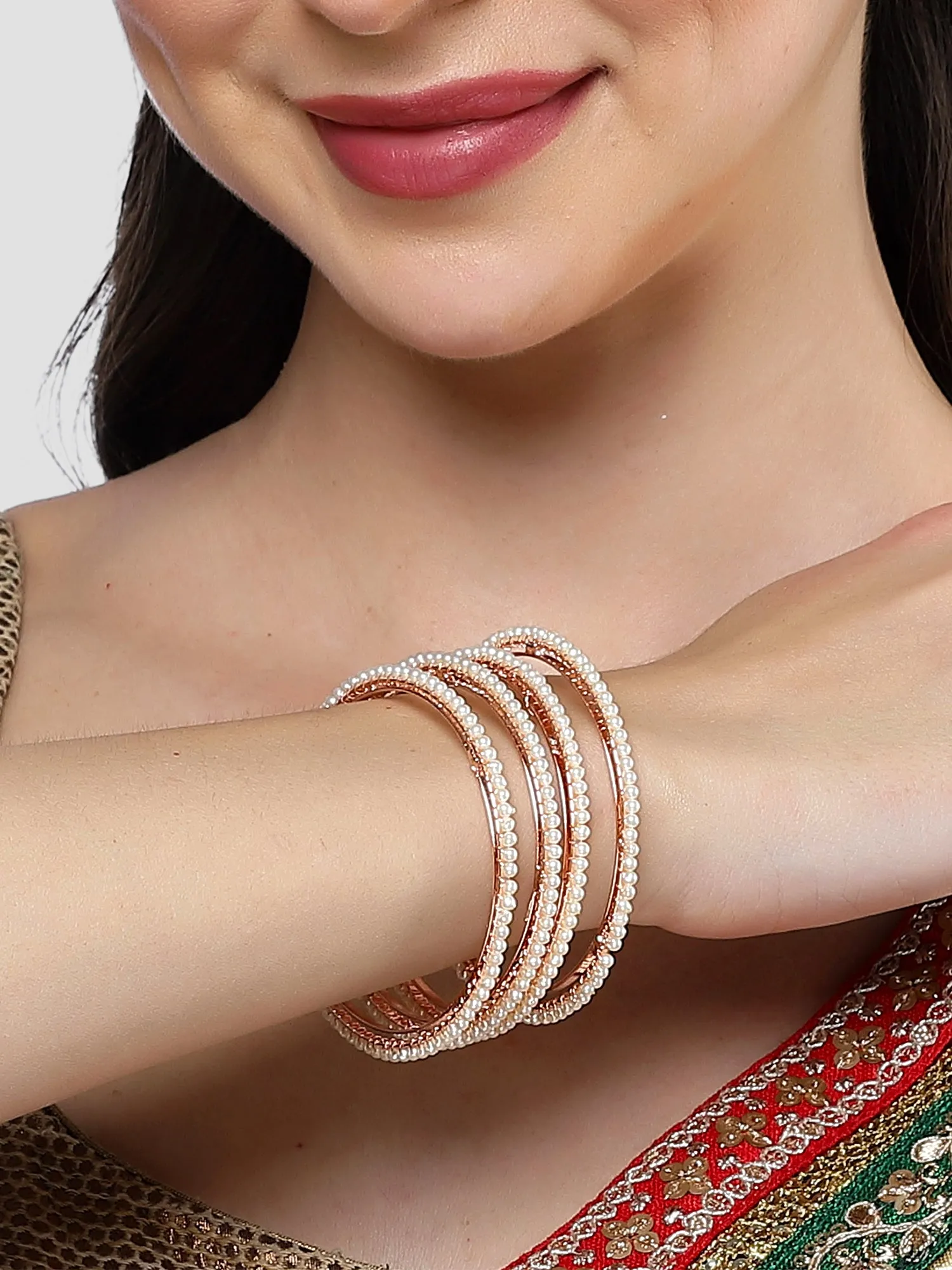 Karatcart Rose Gold Plated Set of 4 Pearl Studded Bangles for Women