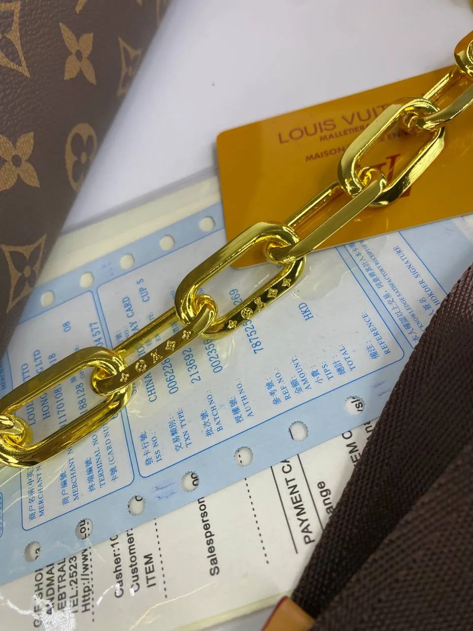 Louis Vuitton Monogram Pouch with Bold Chain Strap