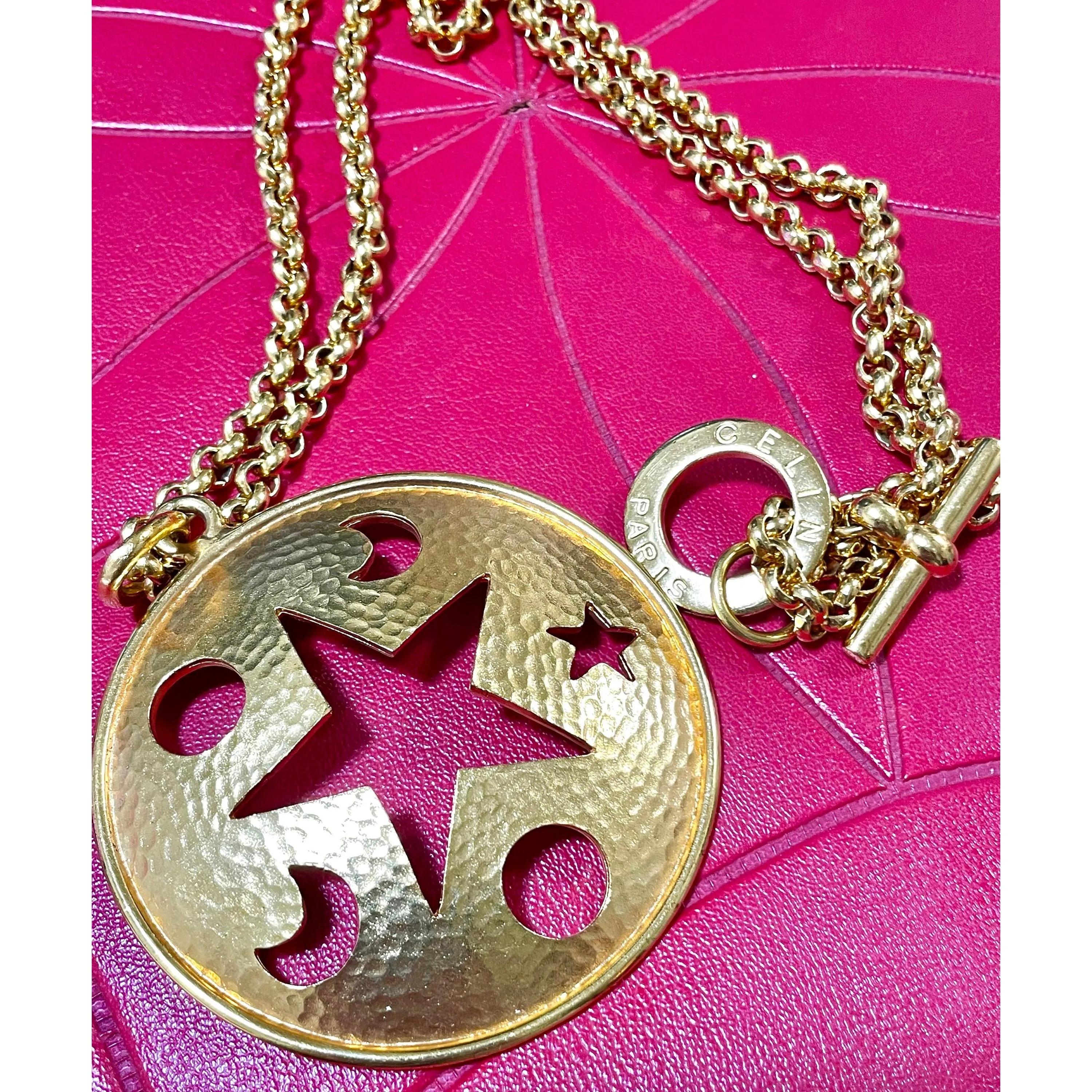 MINT. Vintage Celine gold chain necklace with extra large round top with cut out moon, sun, and star. Rare masterpiece. 060220ac1