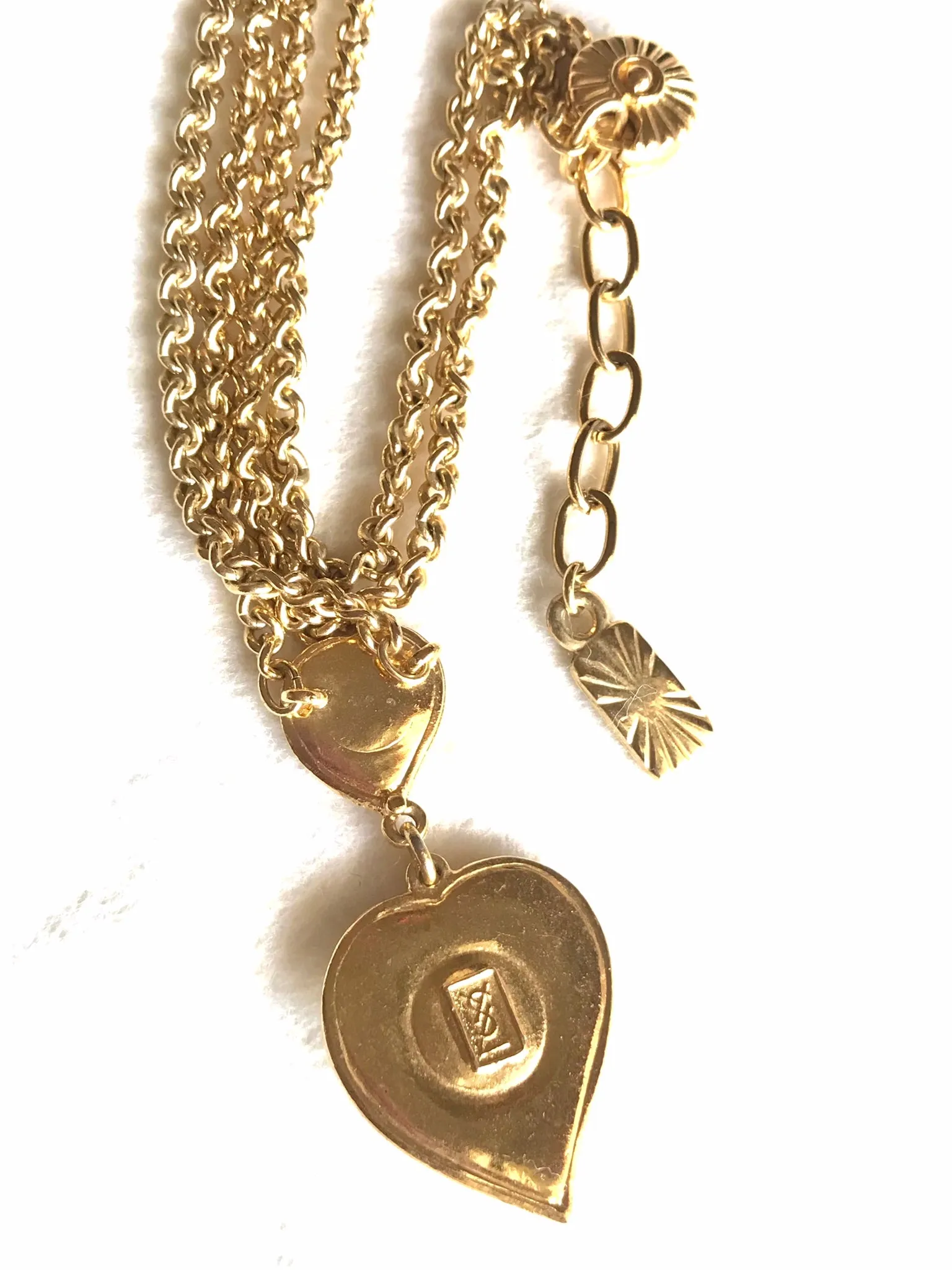 MINT. Vintage Yves Saint Laurent golden chain statement necklace with blue stone and crystal heart pendant top. 0406012