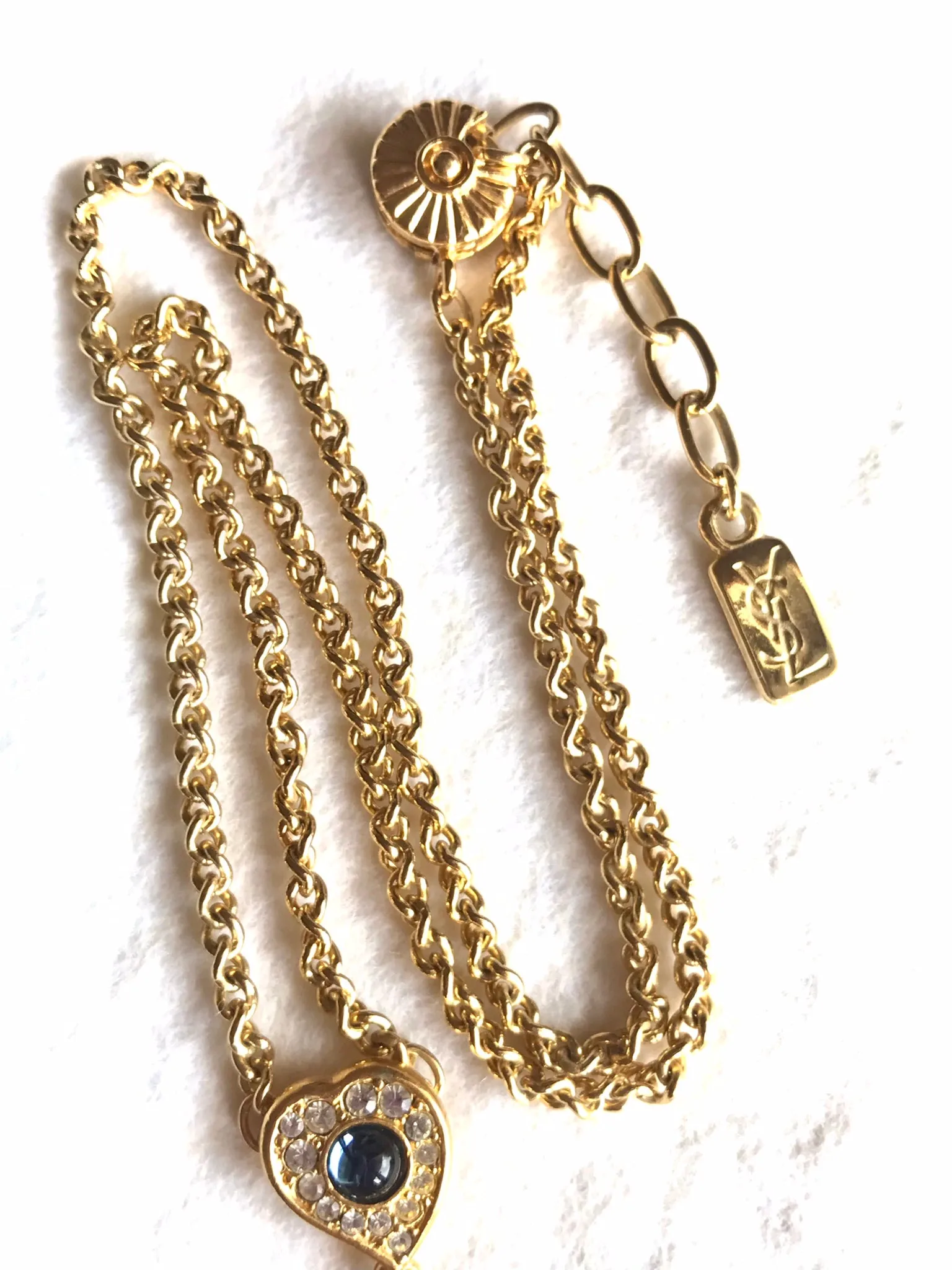MINT. Vintage Yves Saint Laurent golden chain statement necklace with blue stone and crystal heart pendant top. 0406012
