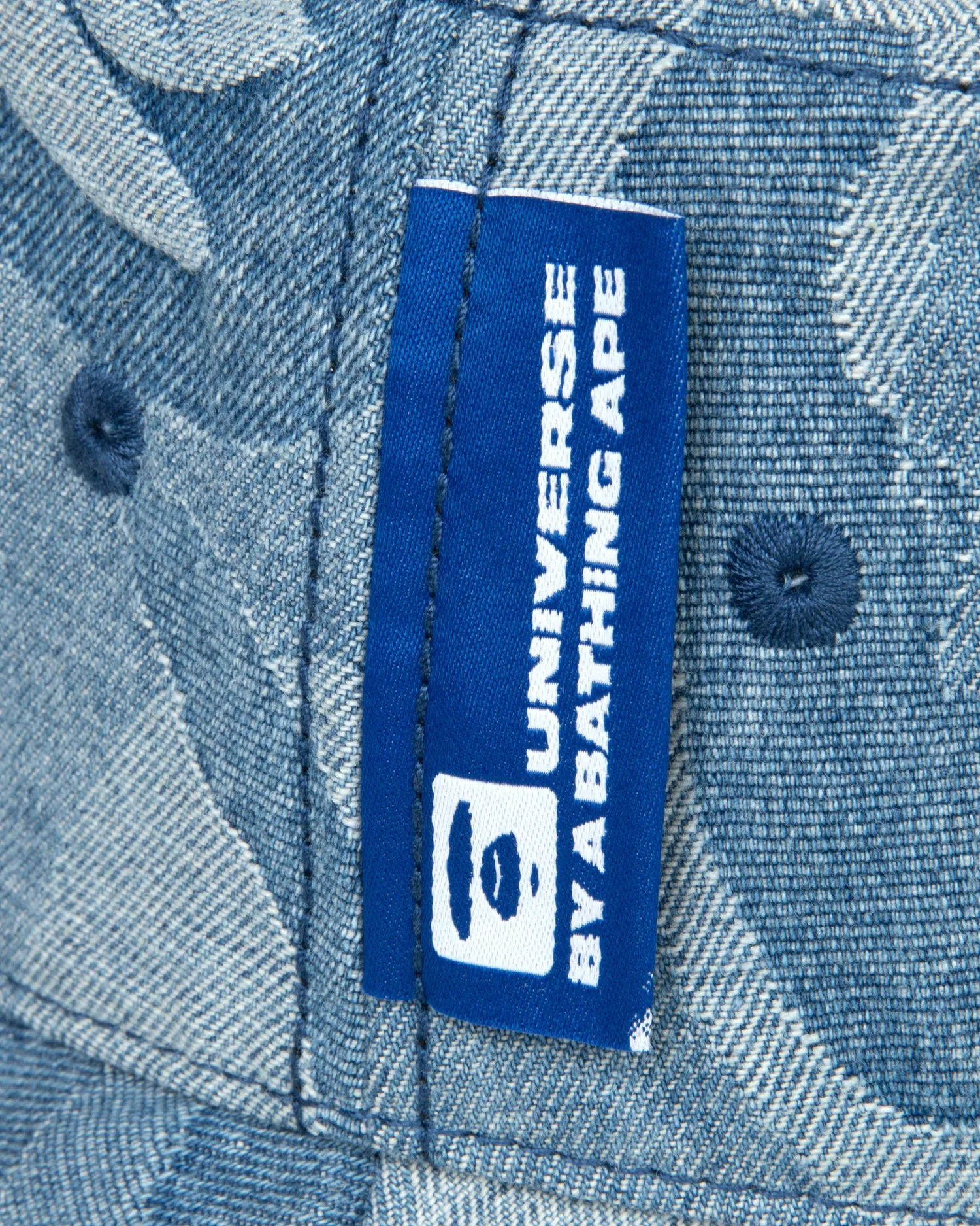 Moonface denim bucket hat