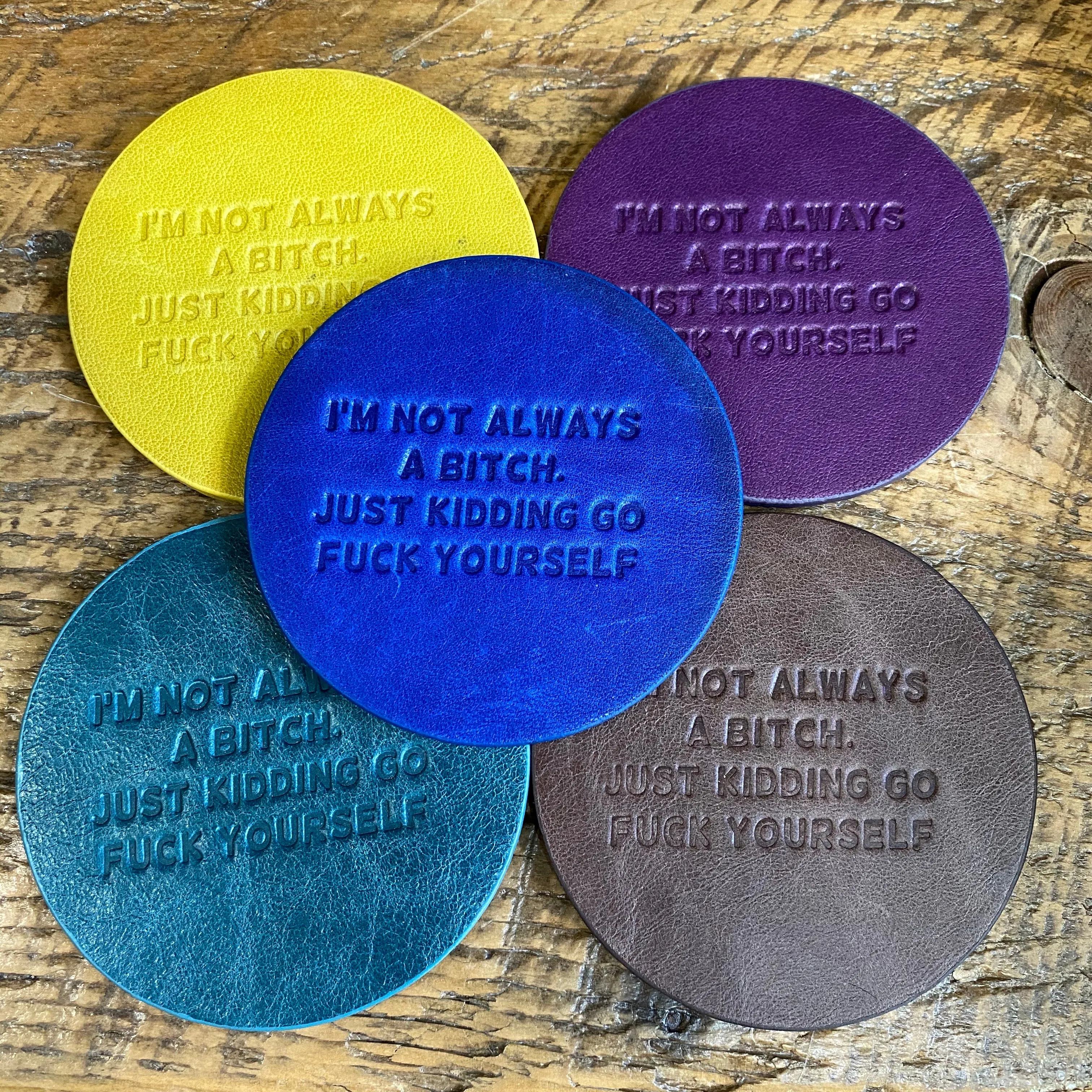 Snarky assorted color embossed leather coasters, sets of 5