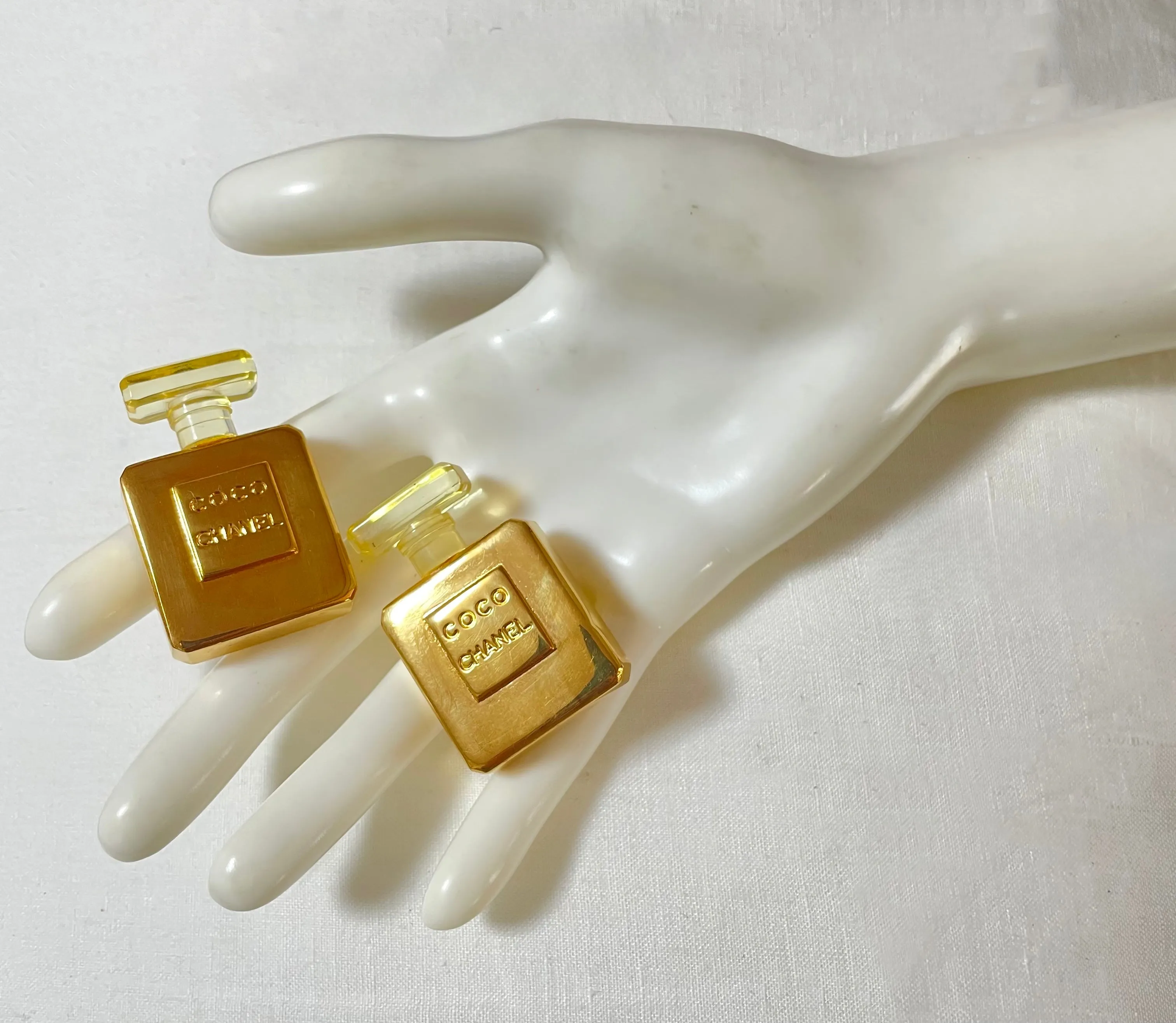 Vintage Chanel golden perfume bottle earrings with embossed logo. Large and heavy earrings. 070114ac2