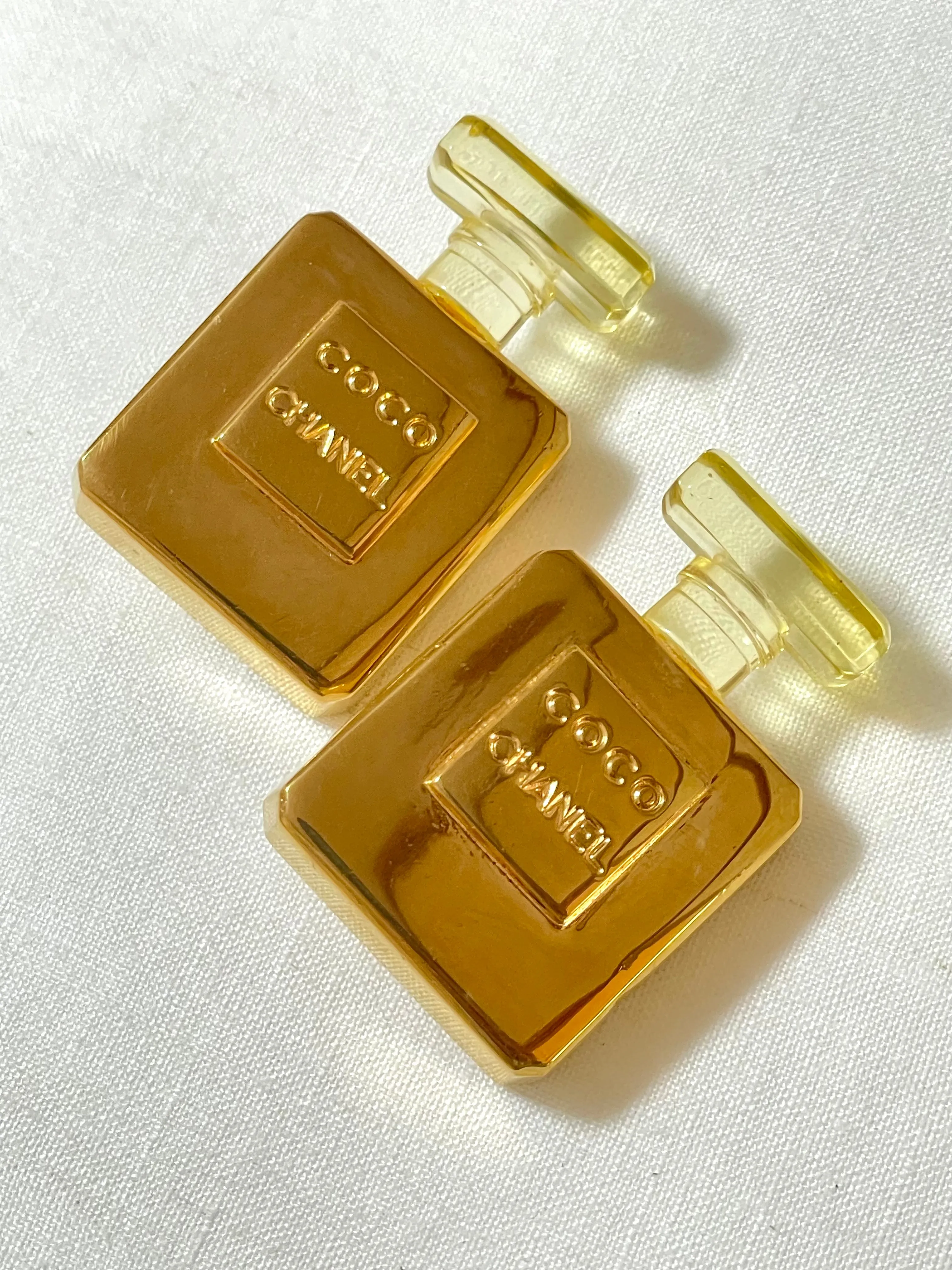 Vintage Chanel golden perfume bottle earrings with embossed logo. Large and heavy earrings. 070114ac2