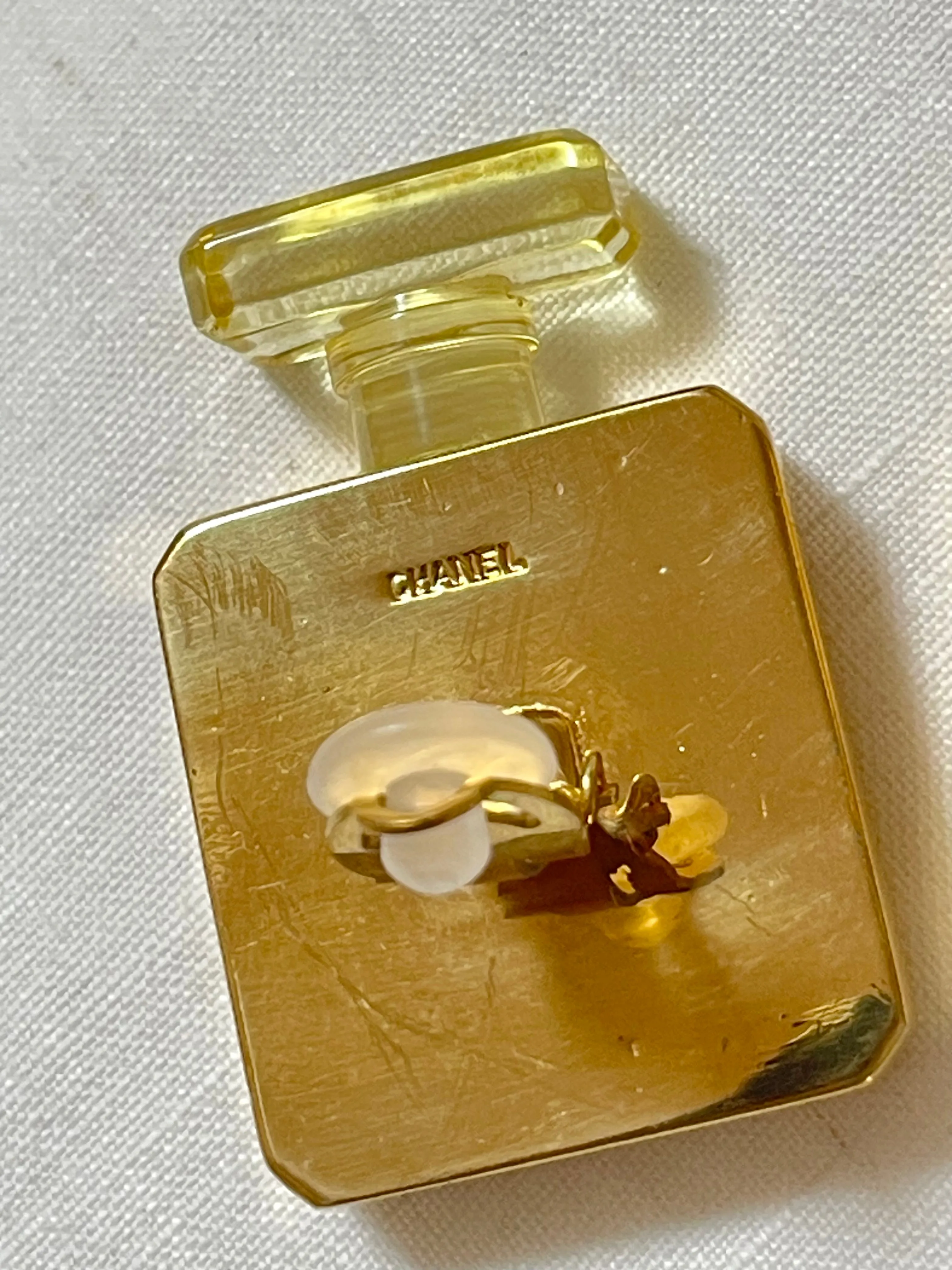 Vintage Chanel golden perfume bottle earrings with embossed logo. Large and heavy earrings. 070114ac2