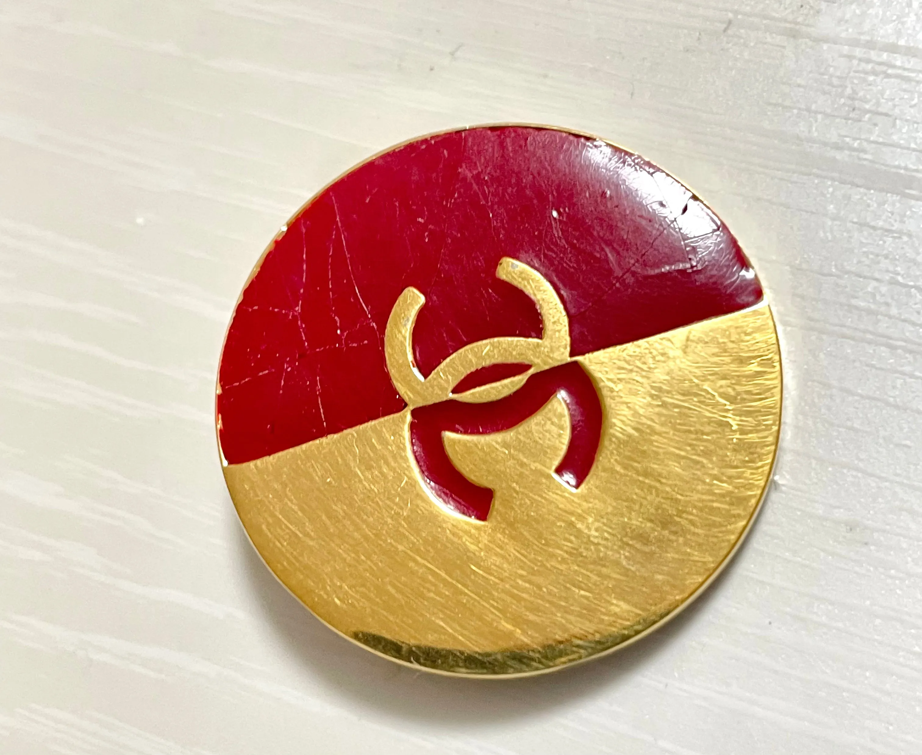 Vintage CHANEL red and gold round CC brooch. Hat, scarf, jacket. Great gift. 050619ya