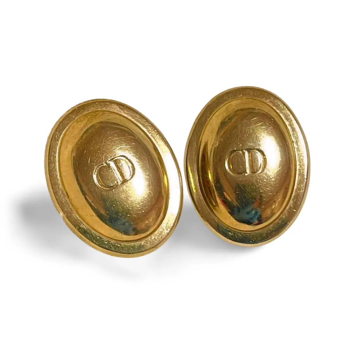 Vintage Christian Dior oval shape earrings with CD embossed logo. Classic jewelry. Germany. 070218ys3
