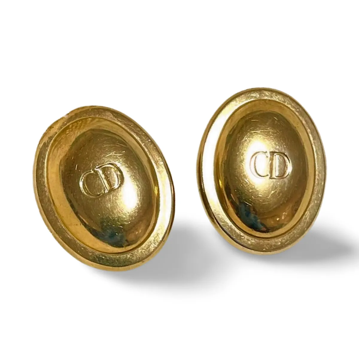 Vintage Christian Dior oval shape earrings with CD embossed logo. Classic jewelry. Germany. 070218ys3