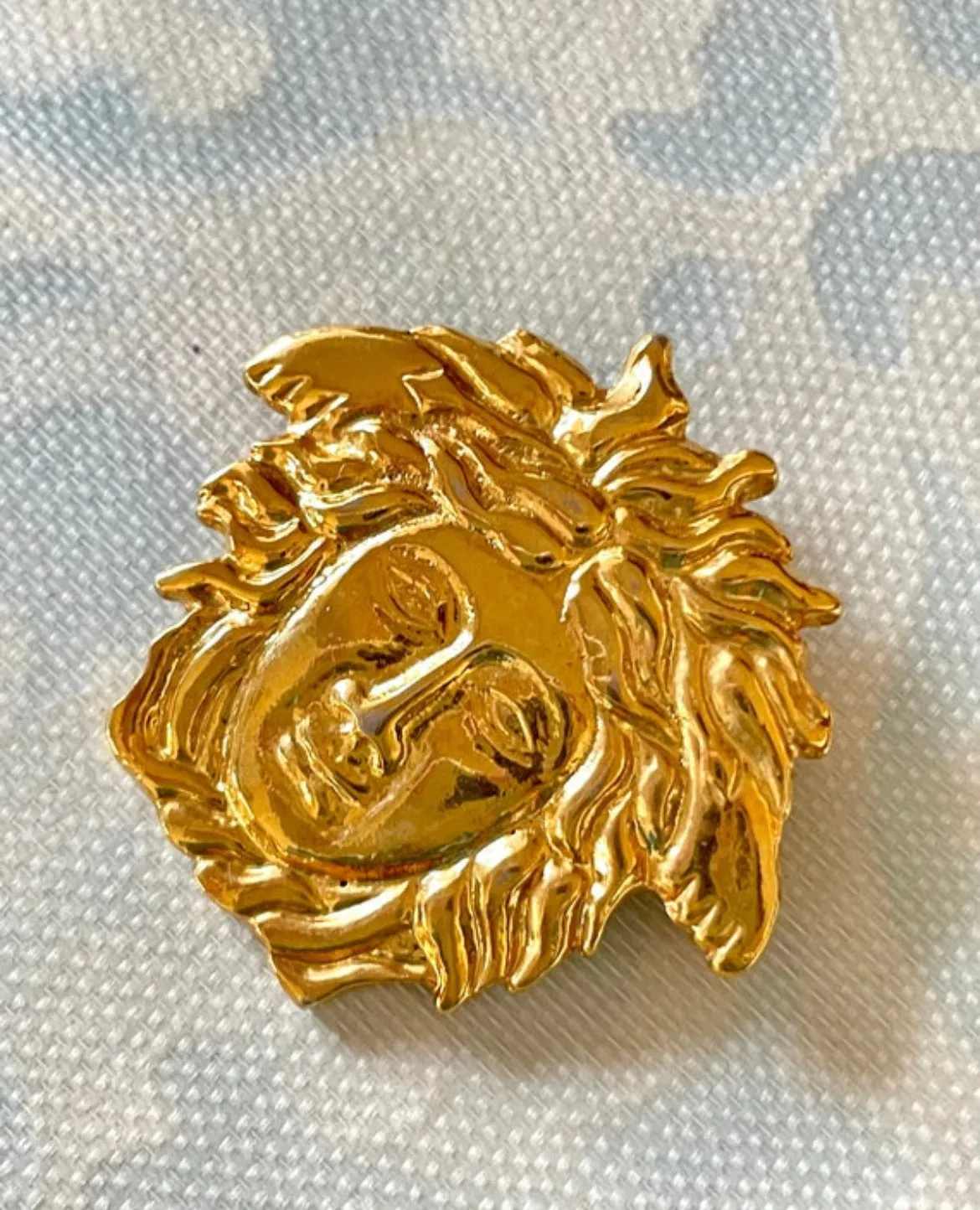 Vintage Gianni Versace gold medusa head face brooch. Can be hat, jacket pin. Great gift idea. 0410032