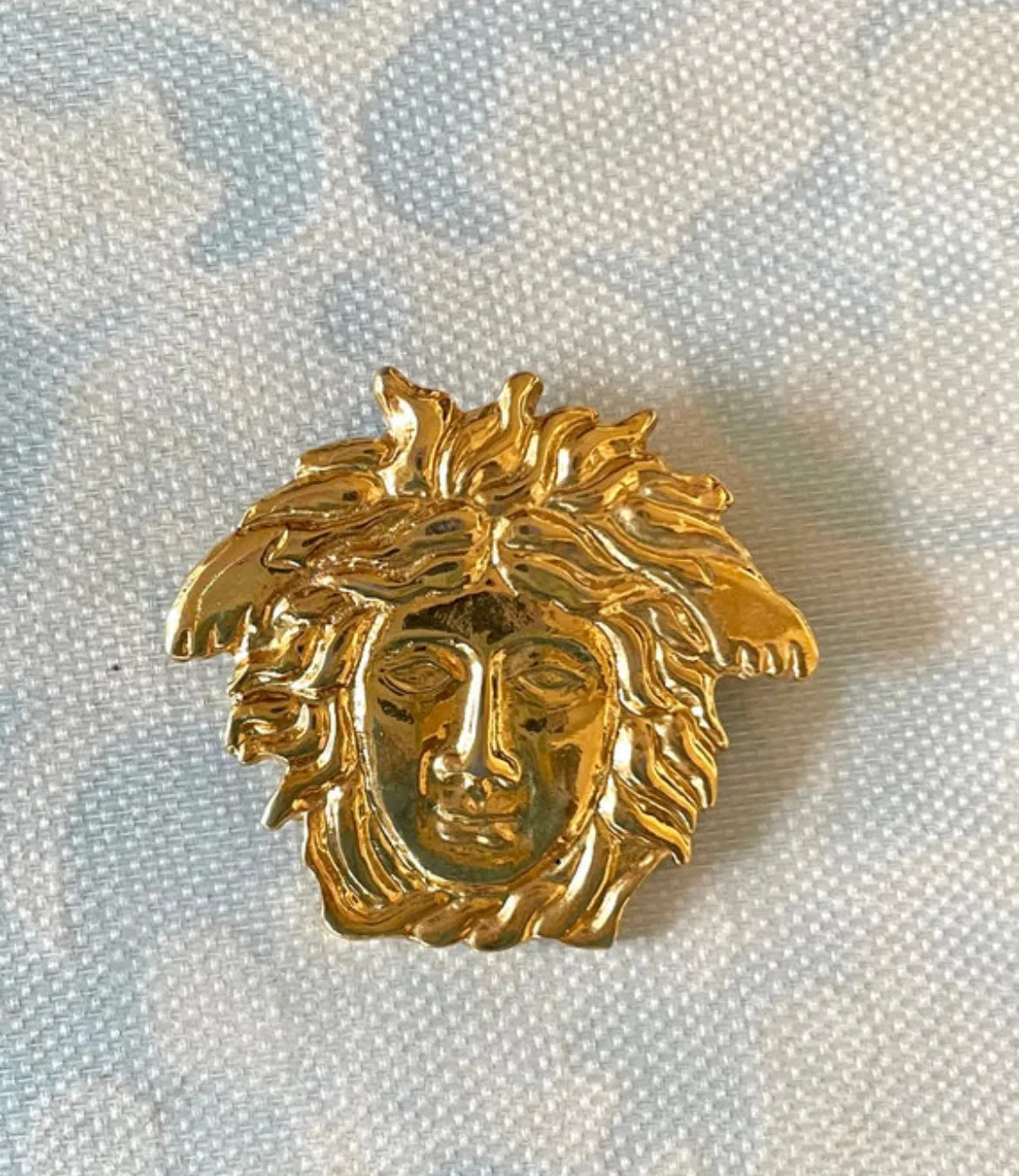 Vintage Gianni Versace gold medusa head face brooch. Can be hat, jacket pin. Great gift idea. 0410032