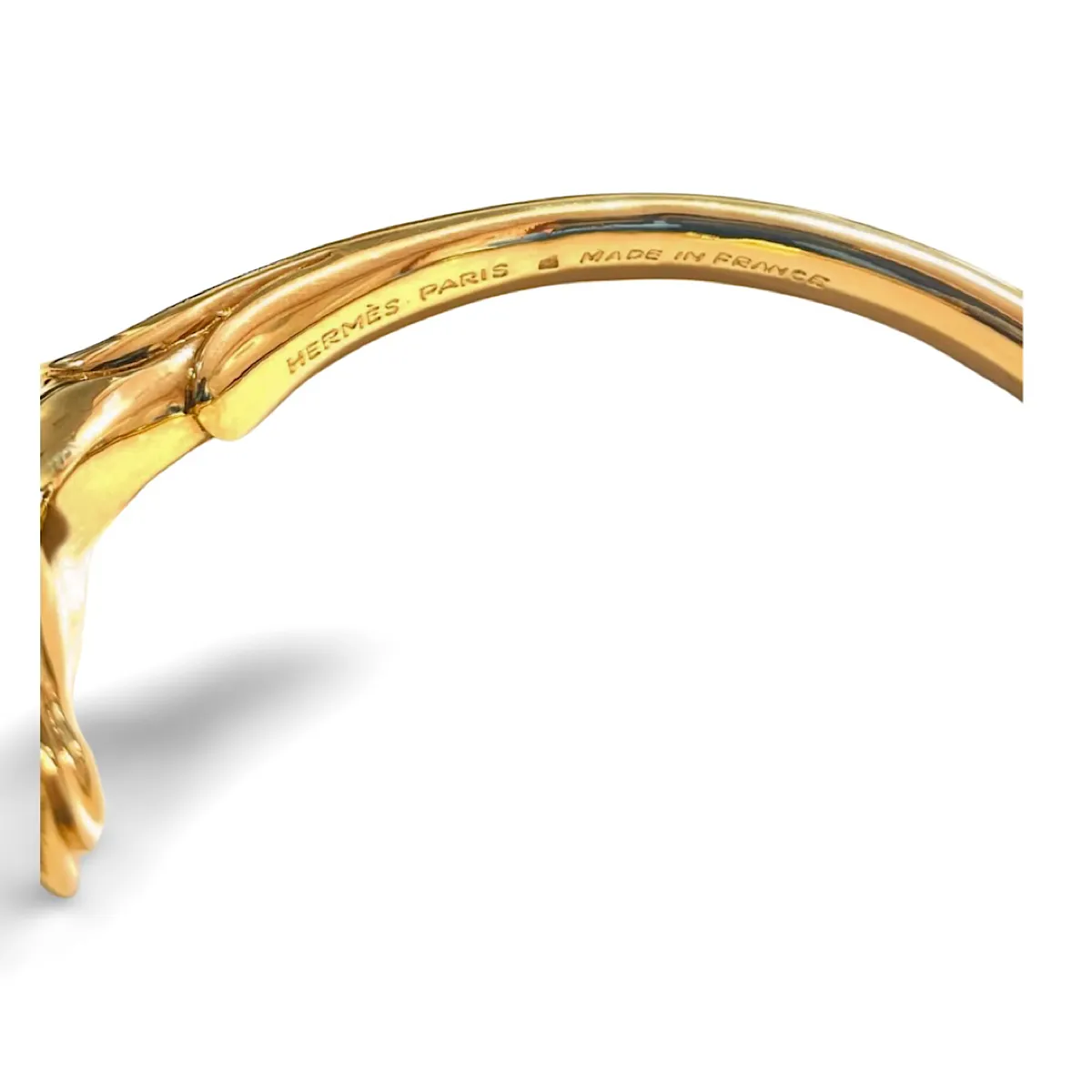 Vintage Hermes golden horse head design bangle, bracelet. Classic jewelry from Hermes. 070218ys7