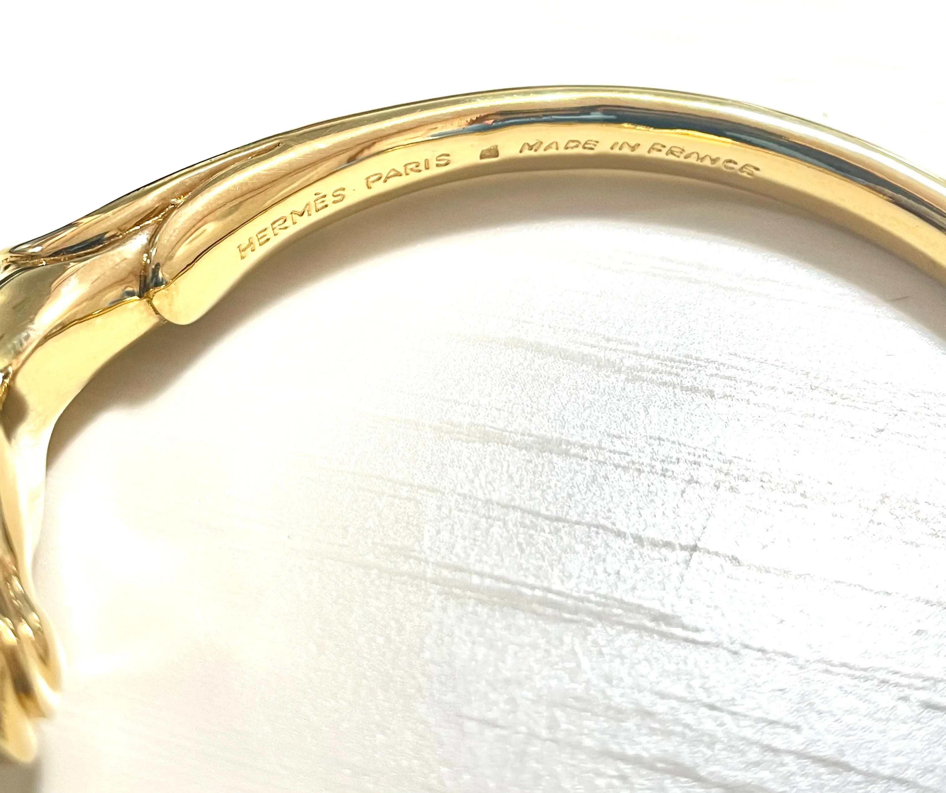 Vintage Hermes golden horse head design bangle, bracelet. Classic jewelry from Hermes. 070218ys7
