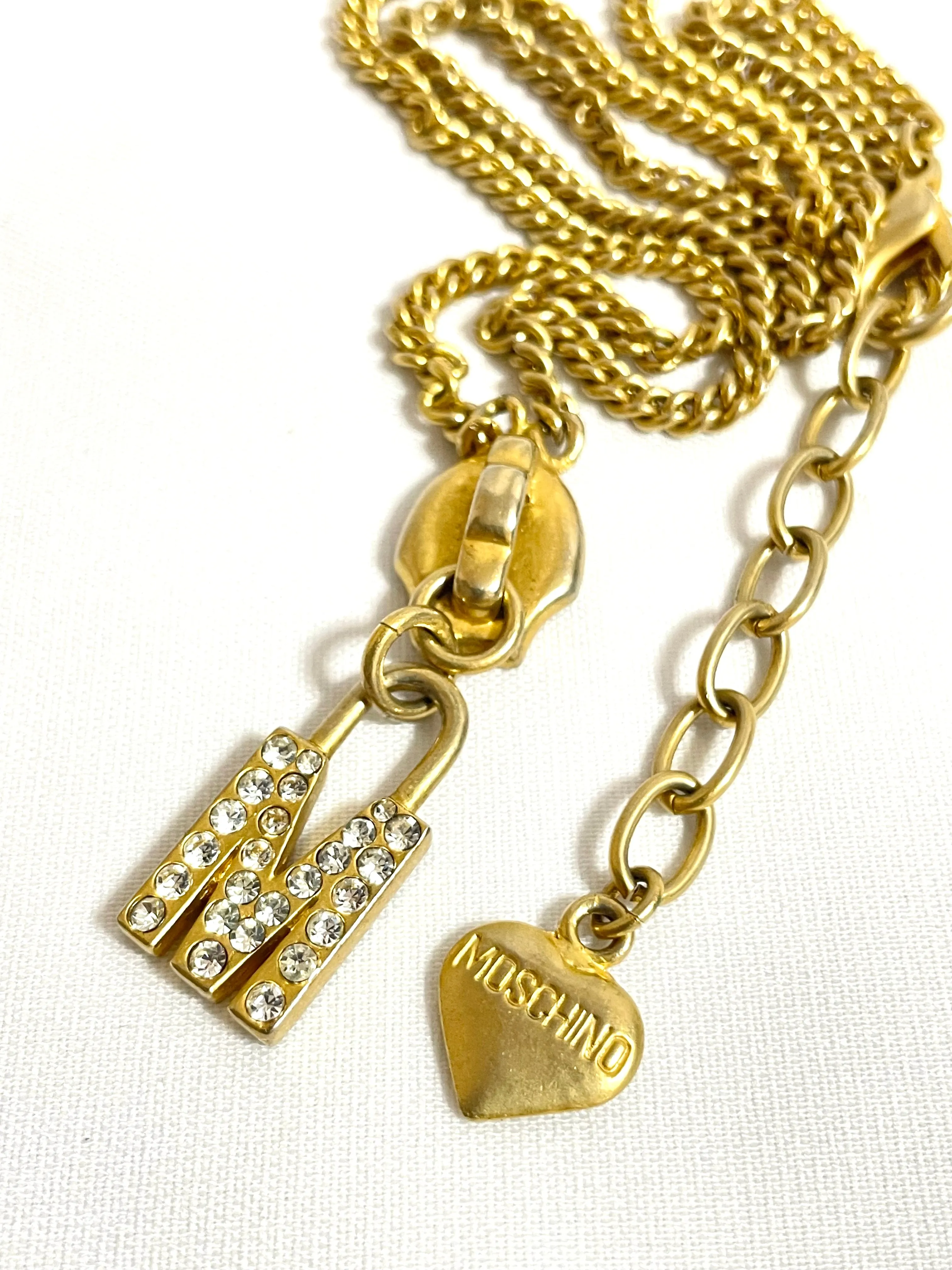 Vintage Moschino chain necklace with zipper pull design M logo heart pendant top. 050806ya1