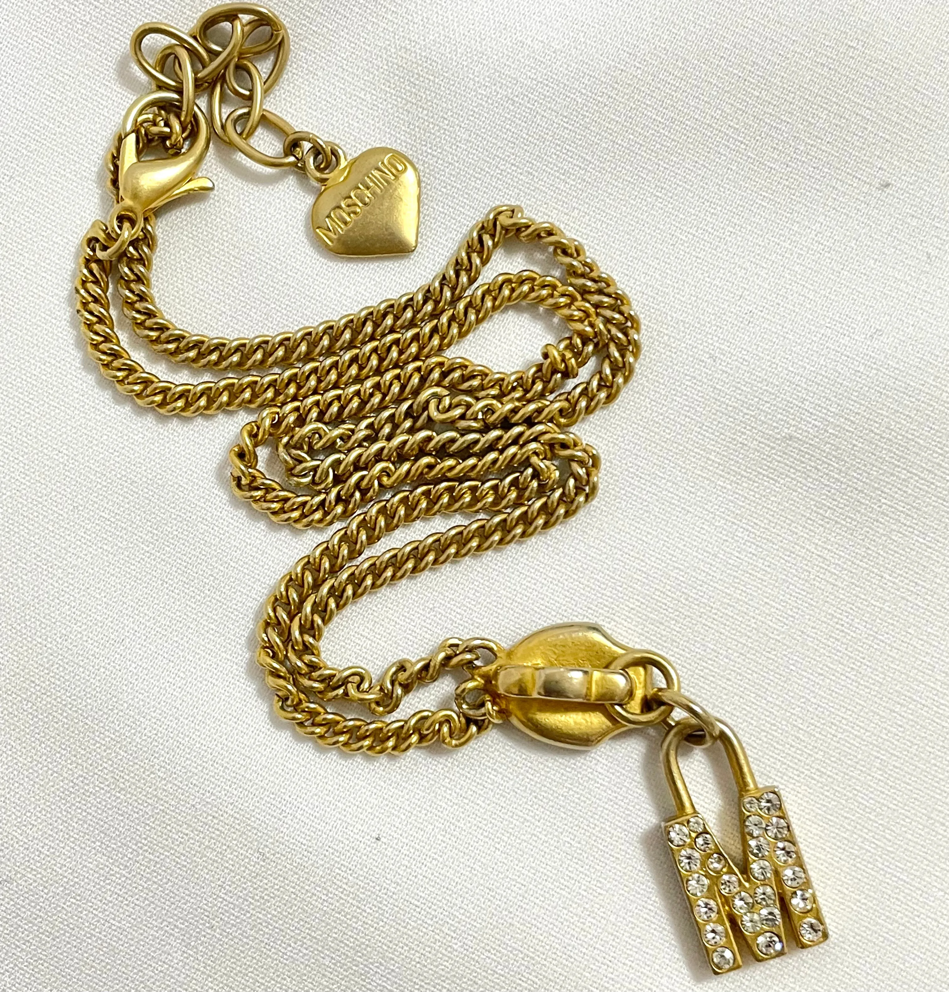 Vintage Moschino chain necklace with zipper pull design M logo heart pendant top. 050806ya1