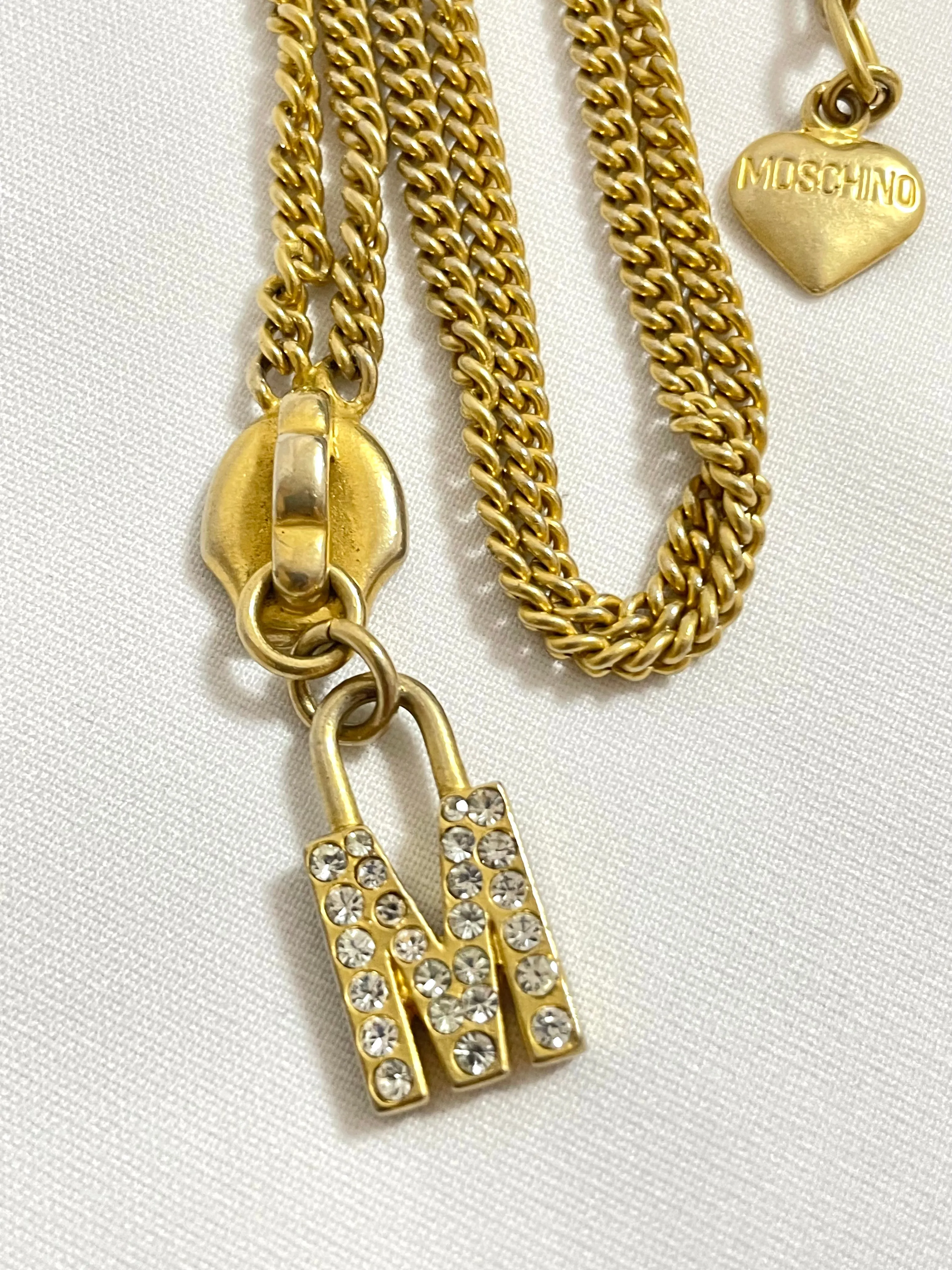 Vintage Moschino chain necklace with zipper pull design M logo heart pendant top. 050806ya1