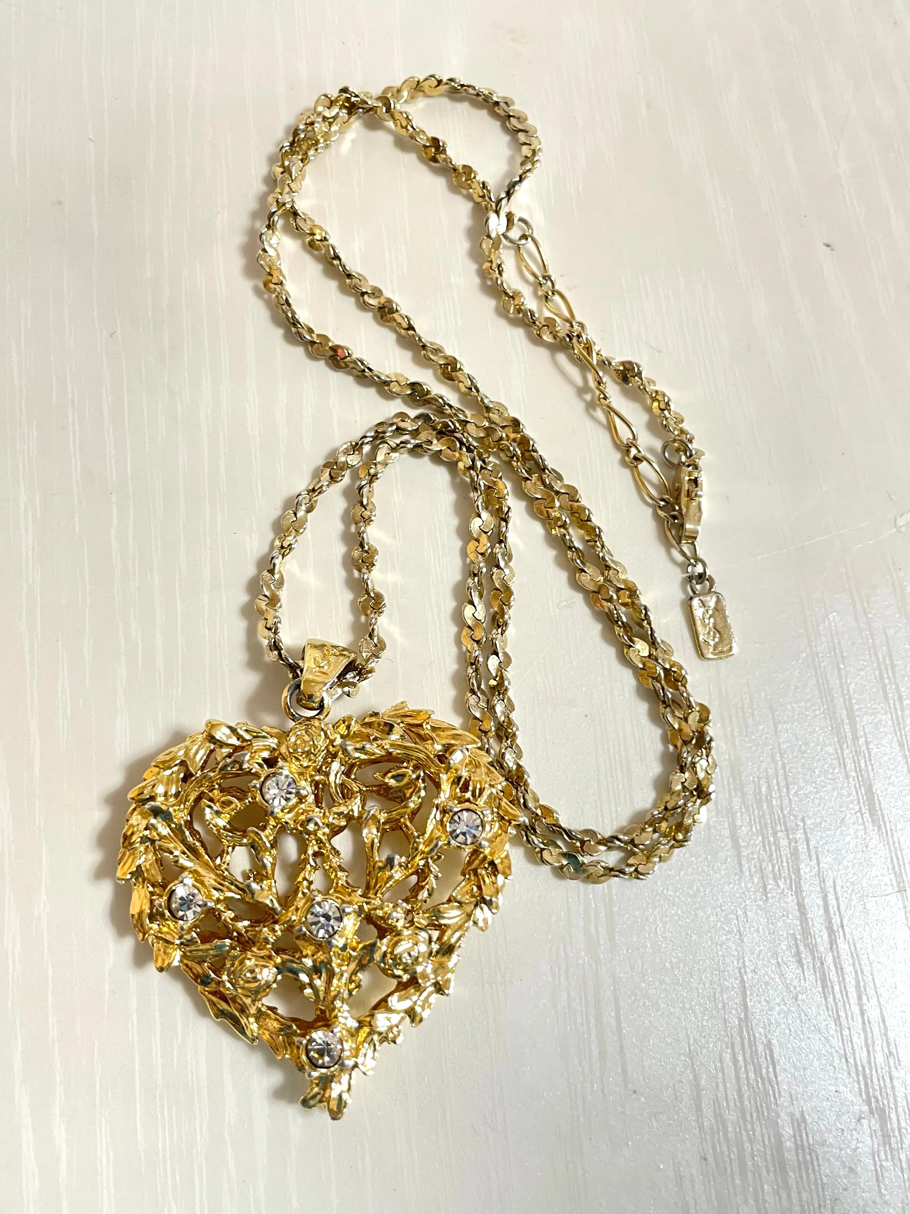 Vintage Yves Saint Laurent golden chain long statement necklace with arabesque heart and crystal pendant top. 050803y3