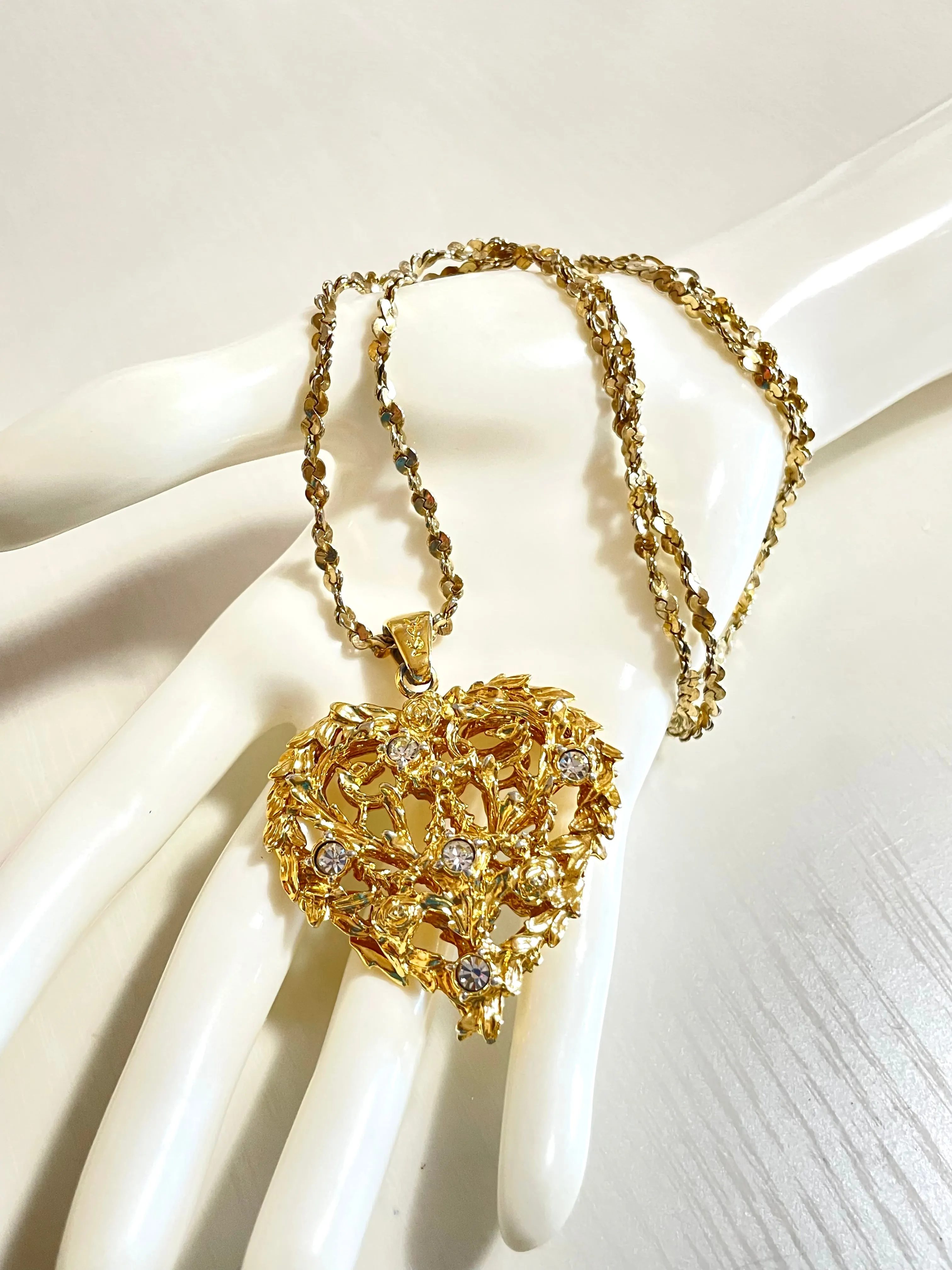 Vintage Yves Saint Laurent golden chain long statement necklace with arabesque heart and crystal pendant top. 050803y3