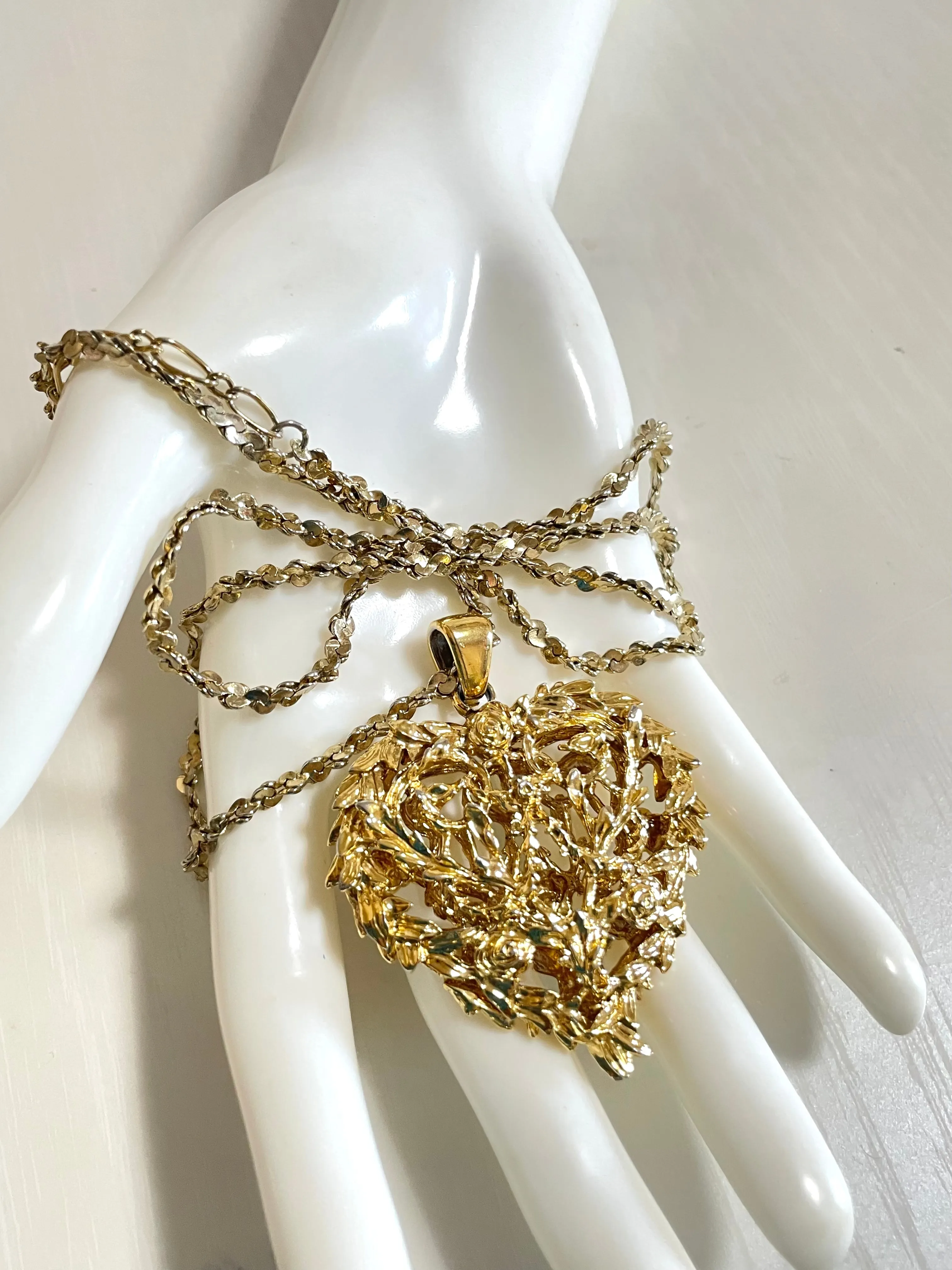 Vintage Yves Saint Laurent golden chain long statement necklace with arabesque heart and crystal pendant top. 050803y3