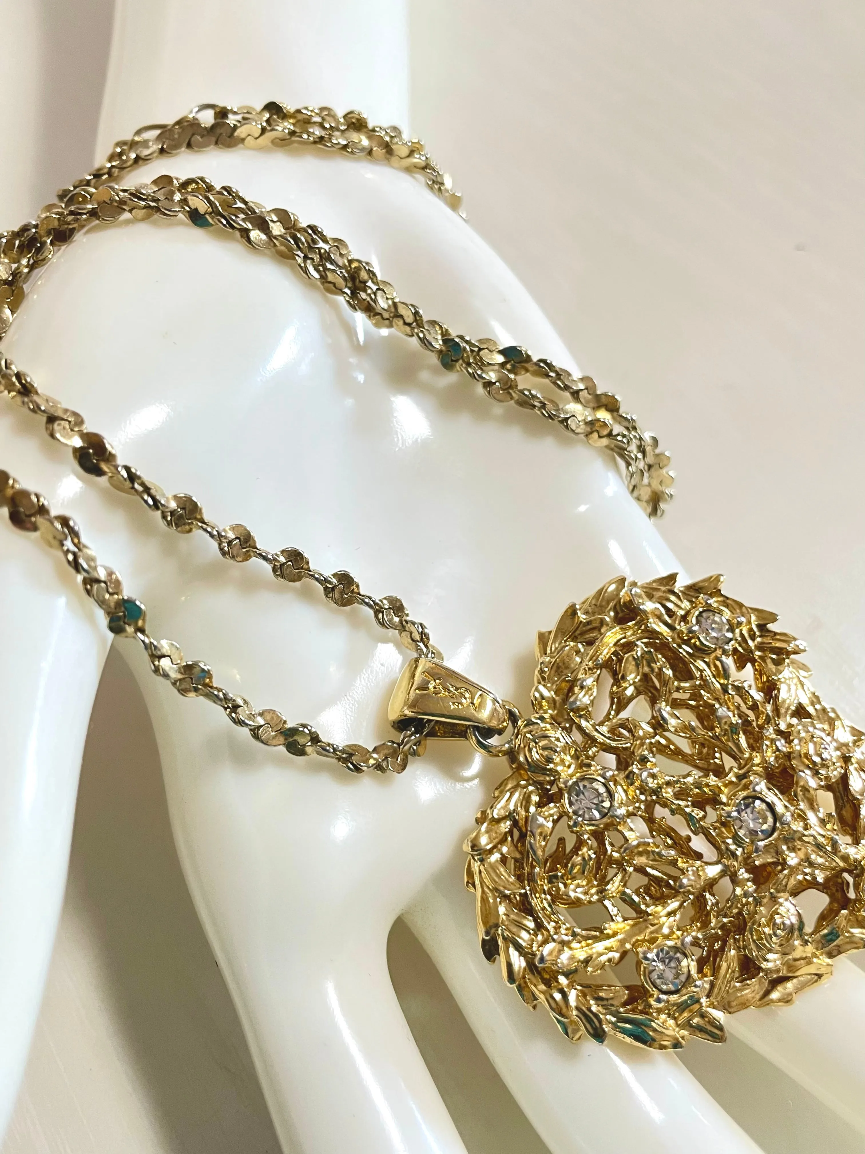 Vintage Yves Saint Laurent golden chain long statement necklace with arabesque heart and crystal pendant top. 050803y3