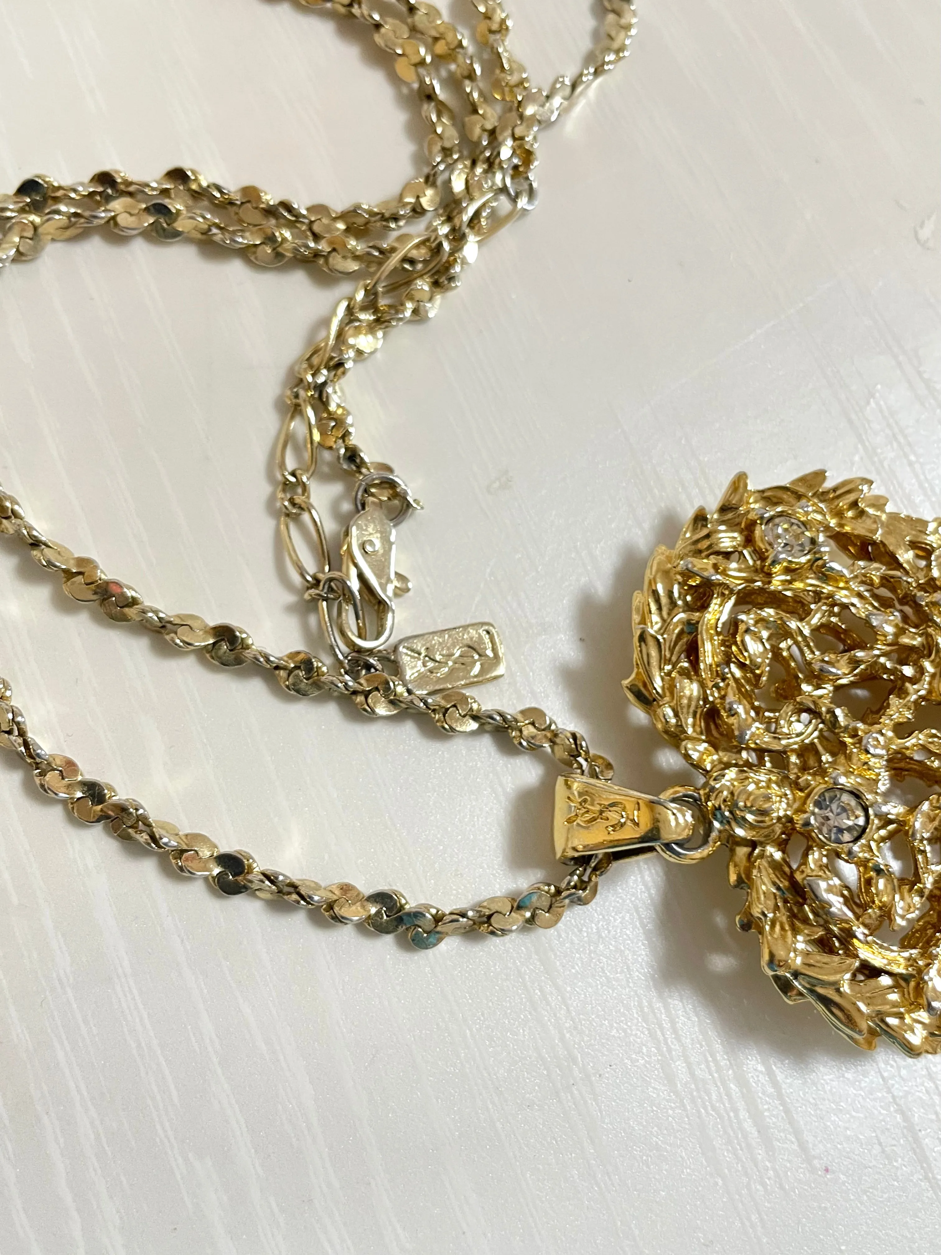 Vintage Yves Saint Laurent golden chain long statement necklace with arabesque heart and crystal pendant top. 050803y3