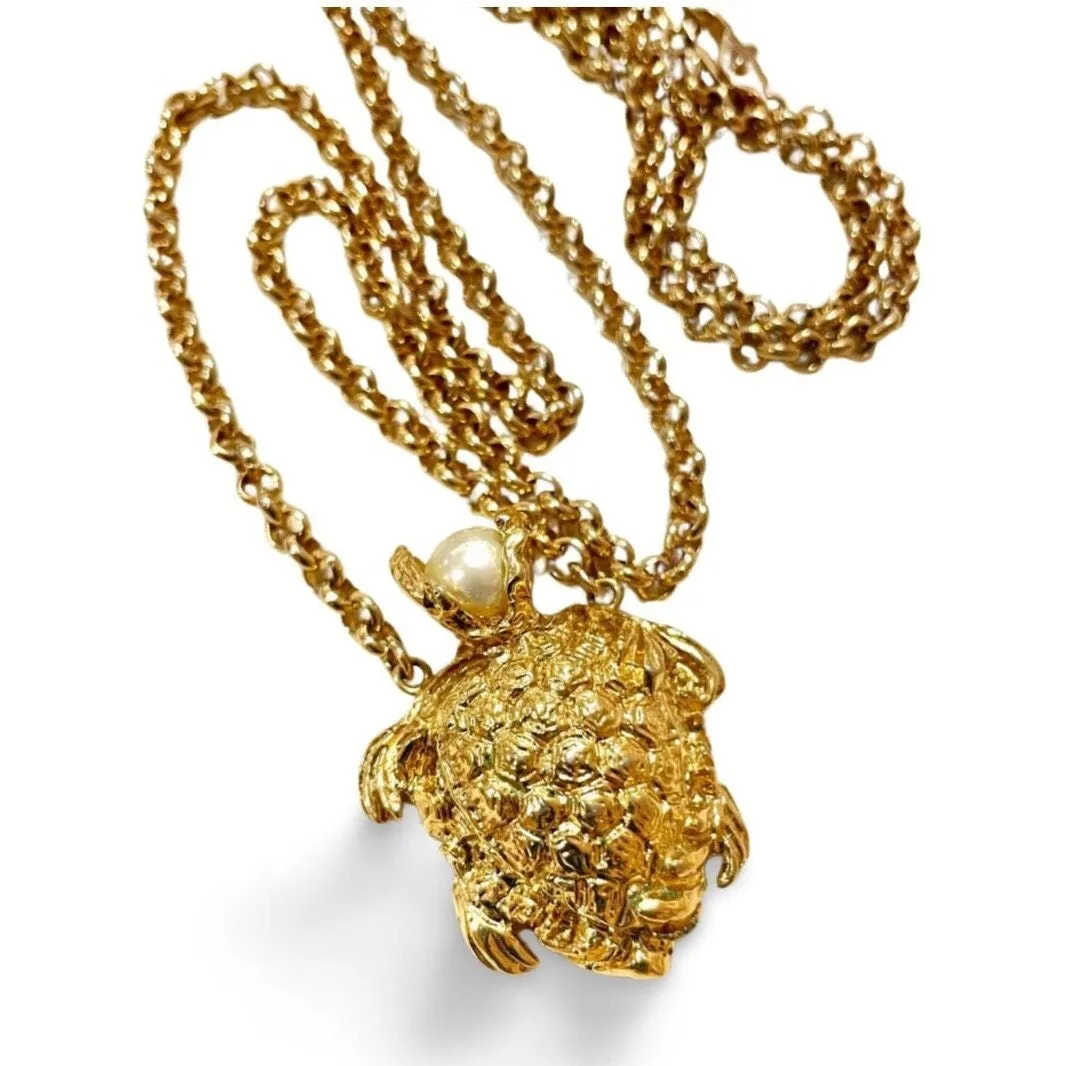 Vintage Yves Saint Laurent golden chain statement necklace with a faux pearl head golden turtle top. Must have jewelry piece. 060123ac6